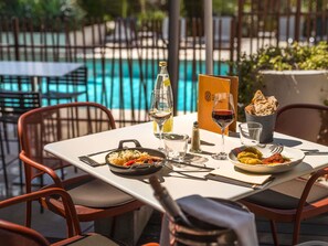 Breakfast, lunch, dinner served; French cuisine, pool views 