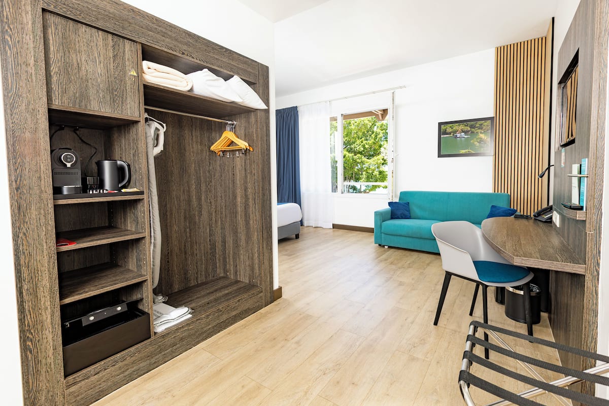 deluxe room, 1 double bed with sofa bed, lagoon view (2 guests) | in-room safe, individually furnished, desk, blackout curtains