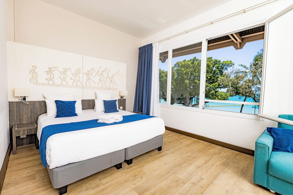 deluxe room, 1 double bed with sofa bed, lagoon view (2 guests) | in-room safe, individually furnished, desk, blackout curtains