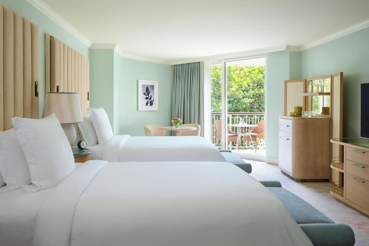 Premium bedding, down comforters, pillowtop beds, minibar