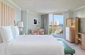 Premium bedding, down comforters, pillowtop beds, minibar at Four Seasons Resort Palm Beach