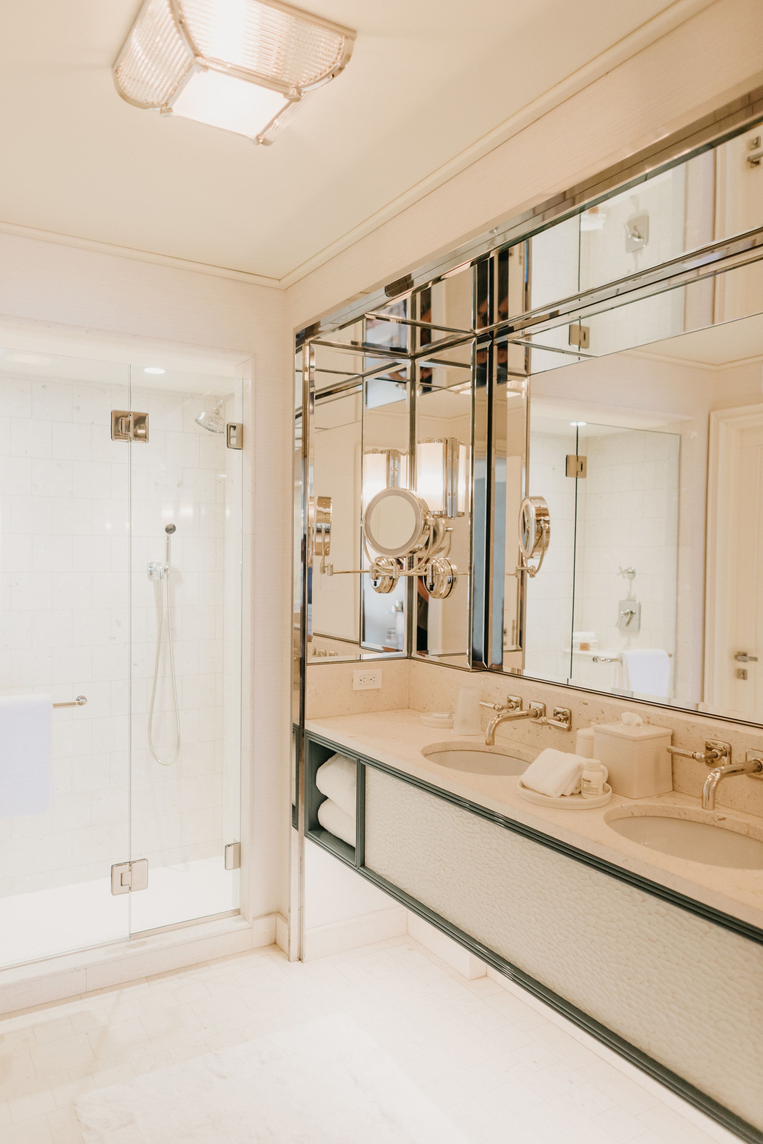 combined shower/bathtub, designer toiletries, hair dryer, bathrobes