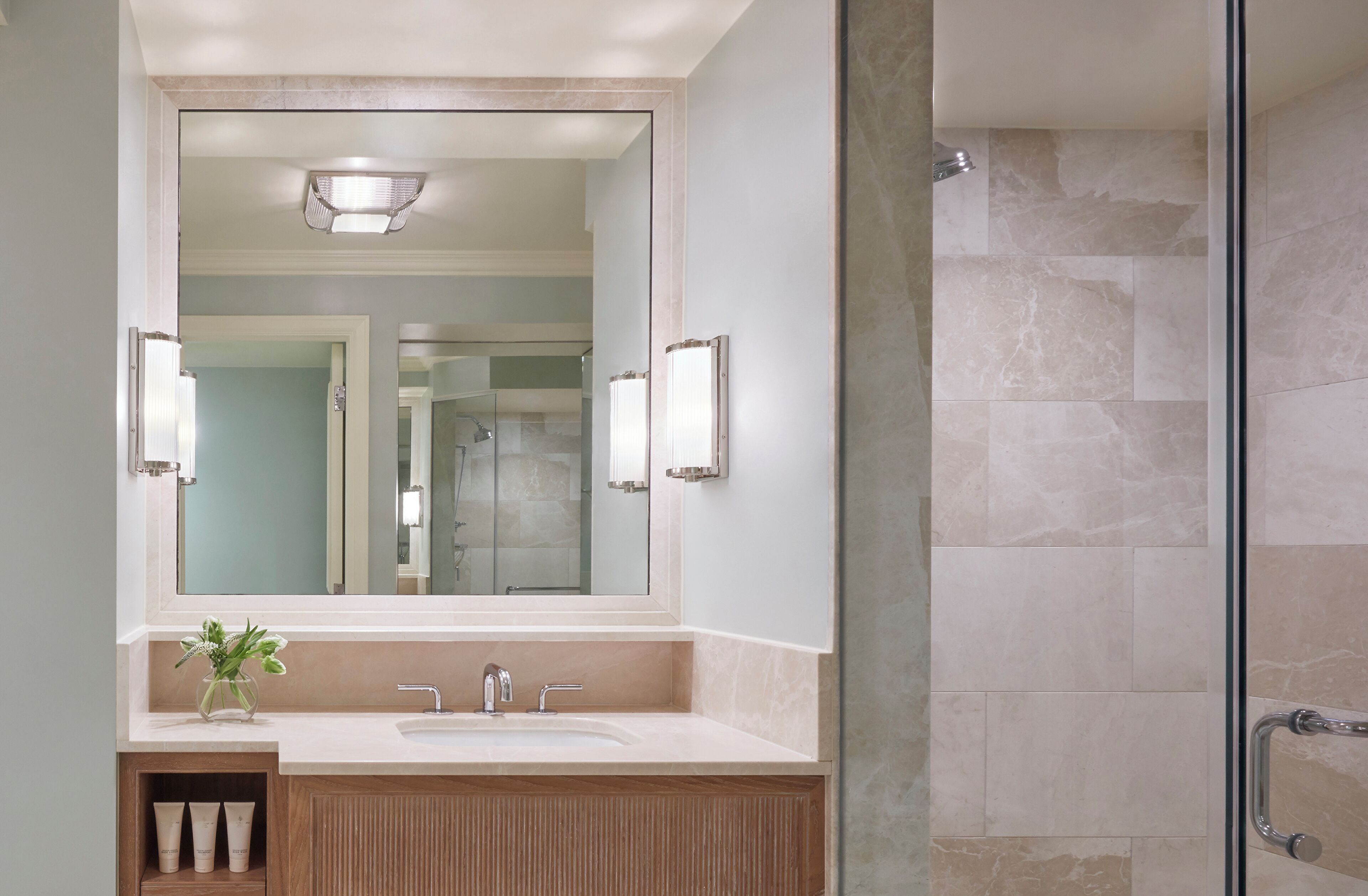 combined shower/bathtub, designer toiletries, hair dryer, bathrobes