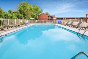 Outdoor pool, open 9 AM to 11 PM, pool umbrellas, pool loungers