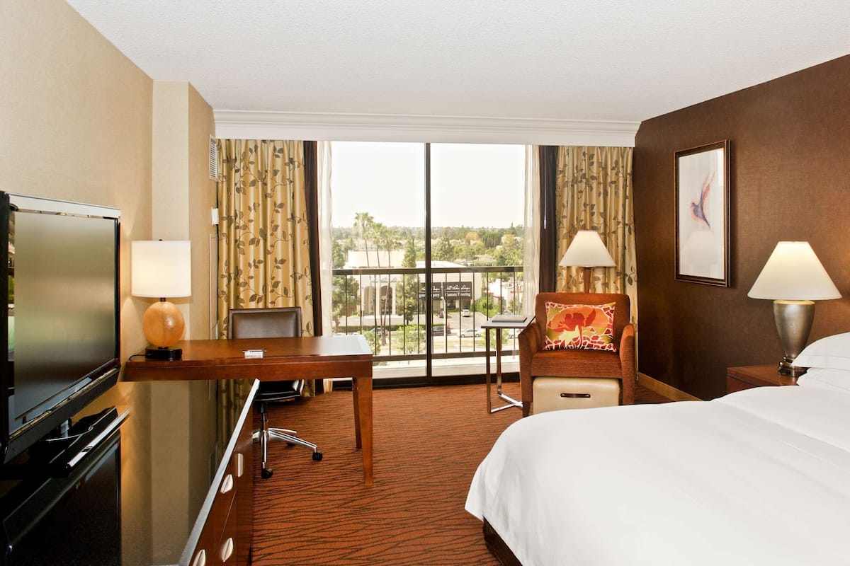 Premium bedding, down duvets, pillow-top beds, in-room safe