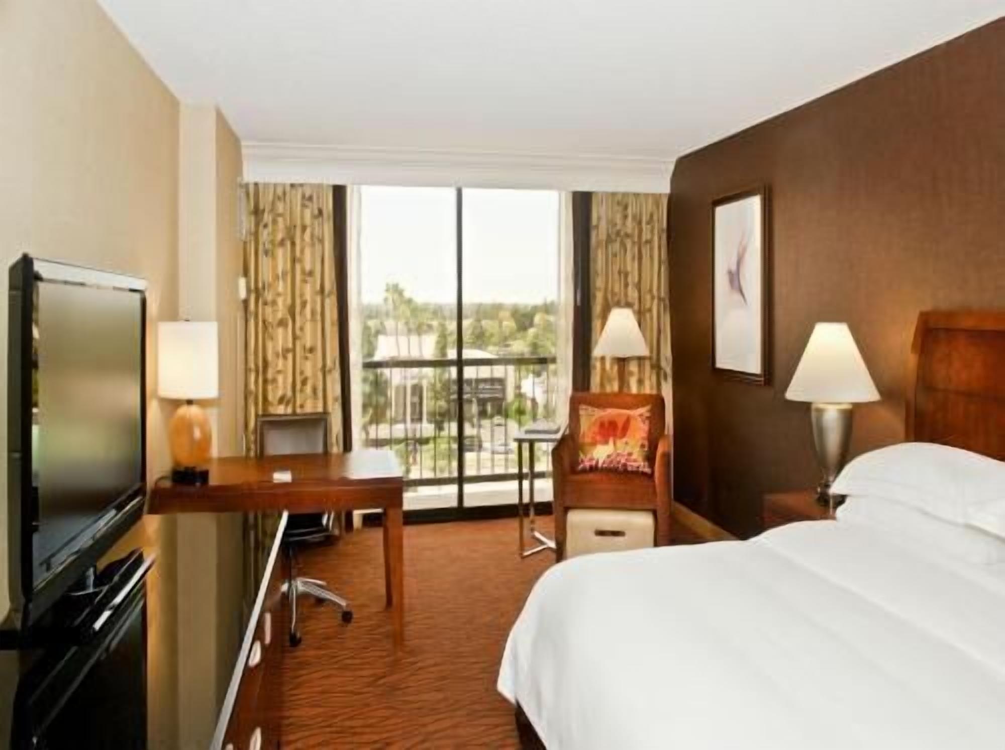 Premium bedding, down comforters, pillowtop beds, in-room safe