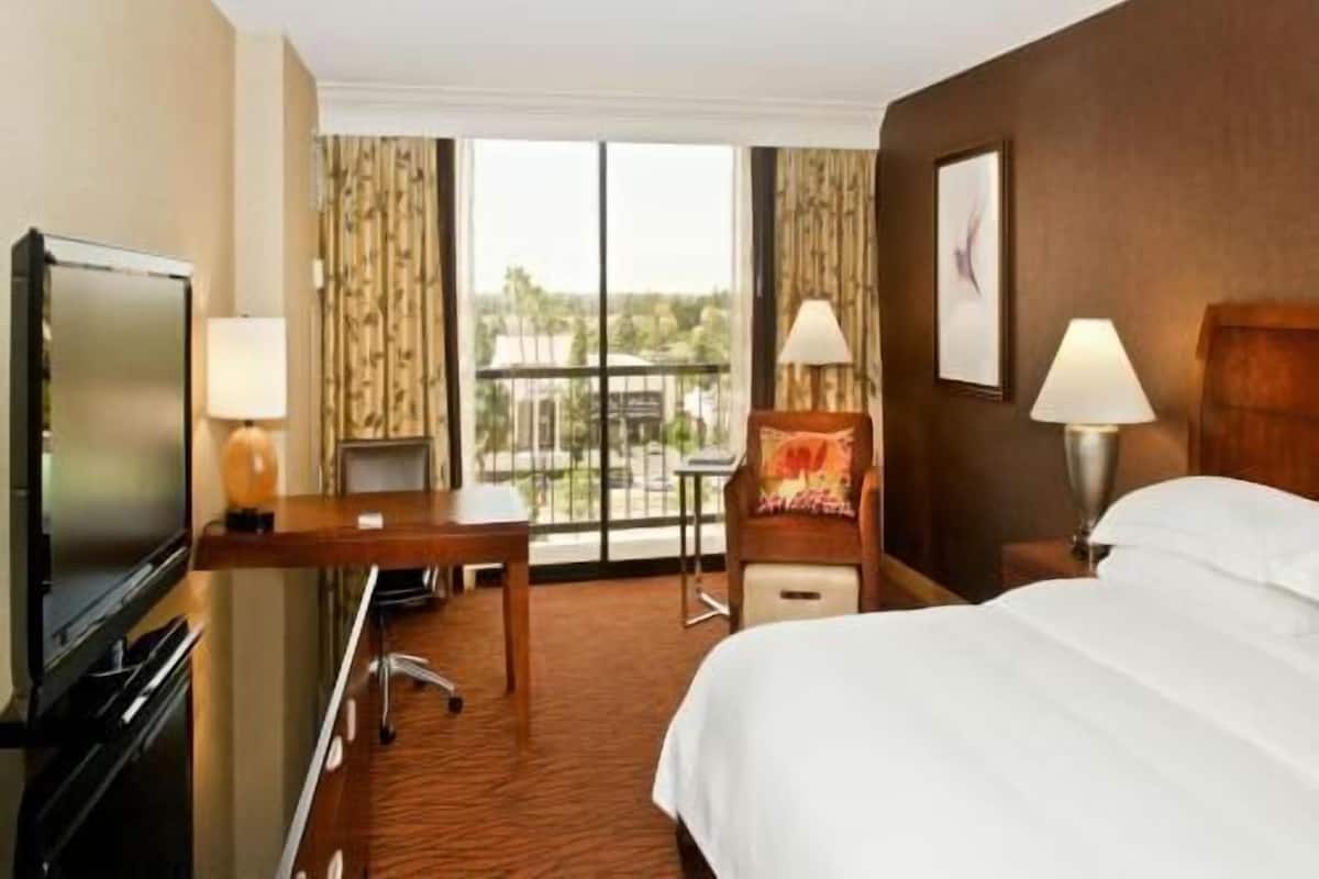 Premium bedding, down duvets, pillow-top beds, in-room safe