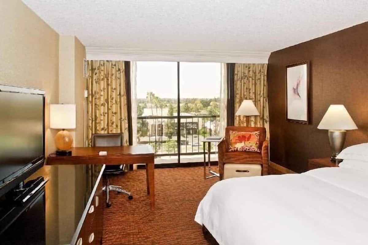 Premium bedding, down duvets, pillow-top beds, in-room safe