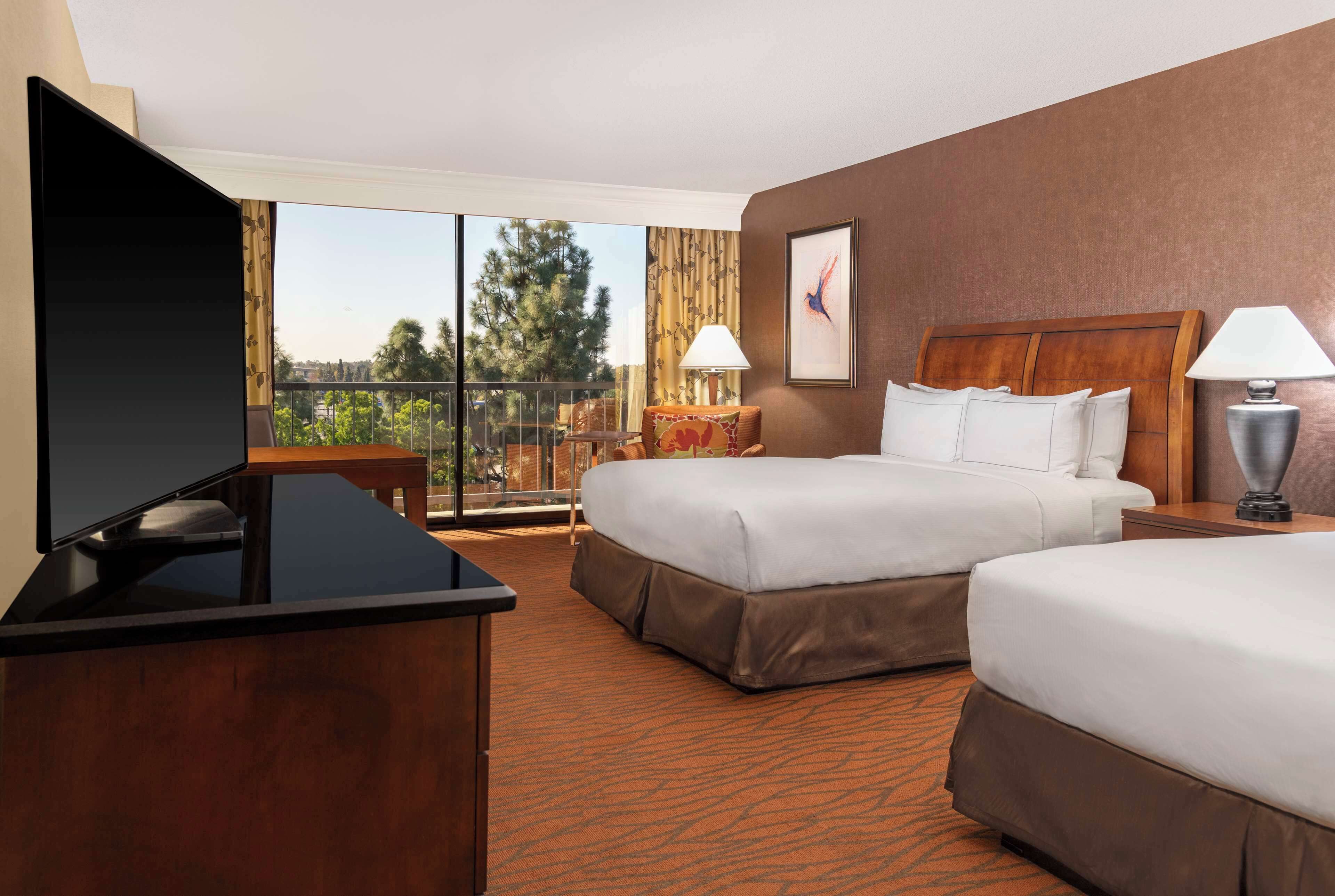 room, 2 queen beds | premium bedding, down duvets, pillow-top beds, in-room safe