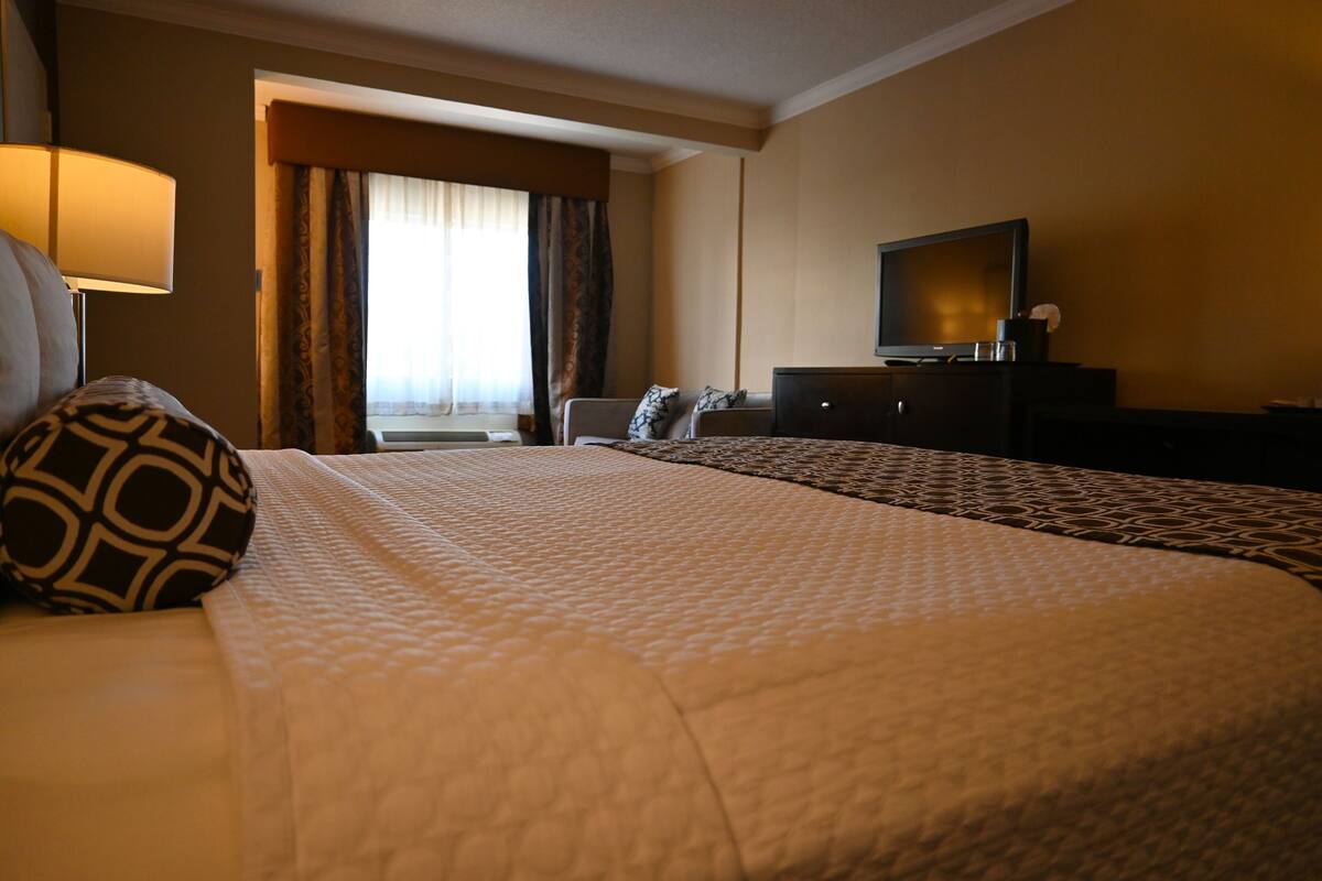 Studio, Multiple Beds, Refrigerator, Ground Floor (Pet Friendly Fee Applies) | Premium bedding, in-room safe, desk, laptop workspace