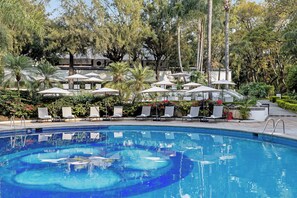 Outdoor pool, open 8:00 AM to 8:00 PM, pool umbrellas, pool loungers