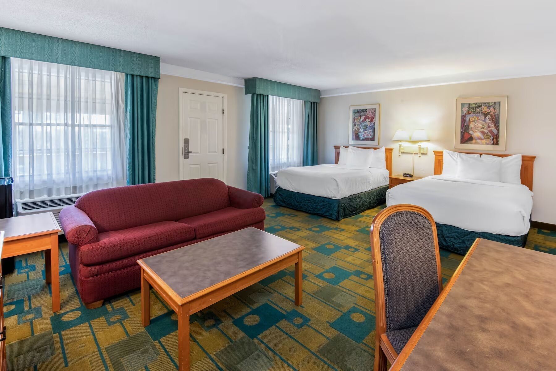Pillow-top beds, desk, blackout curtains, iron/ironing board