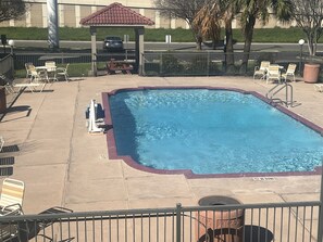 Outdoor pool, pool umbrellas, sun loungers