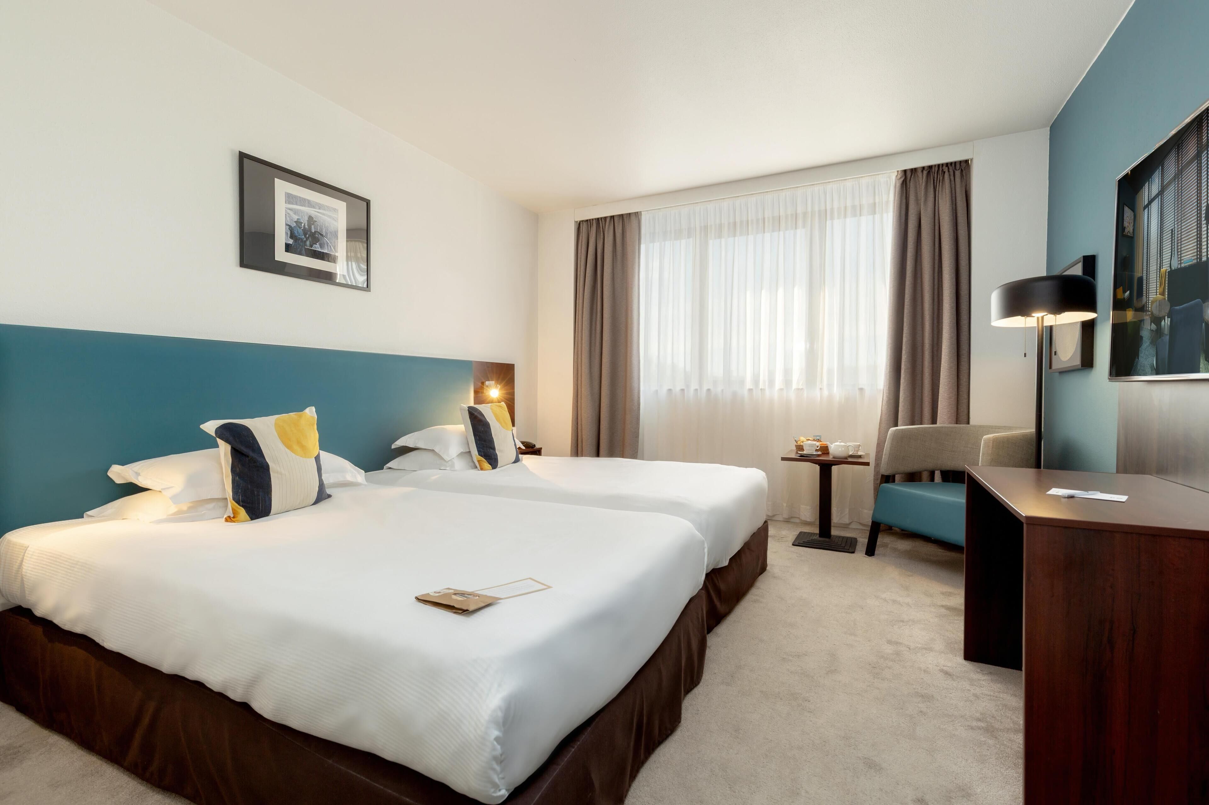 Chambre Triple Standard, plusieurs lits, non-fumeurs | Literie de qualité supérieure, minibar, coffres-forts dans les chambres