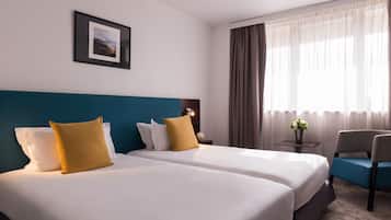 Chambre Classique, 2 lits une place, non-fumeurs | Literie de qualité supérieure, minibar, coffres-forts dans les chambres