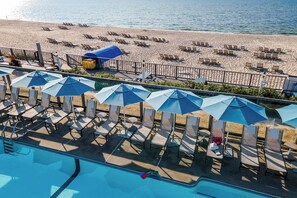 Indoor pool, seasonal outdoor pool, pool umbrellas, pool loungers