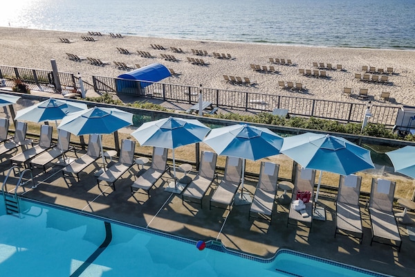 Indoor pool, seasonal outdoor pool, pool umbrellas, pool loungers