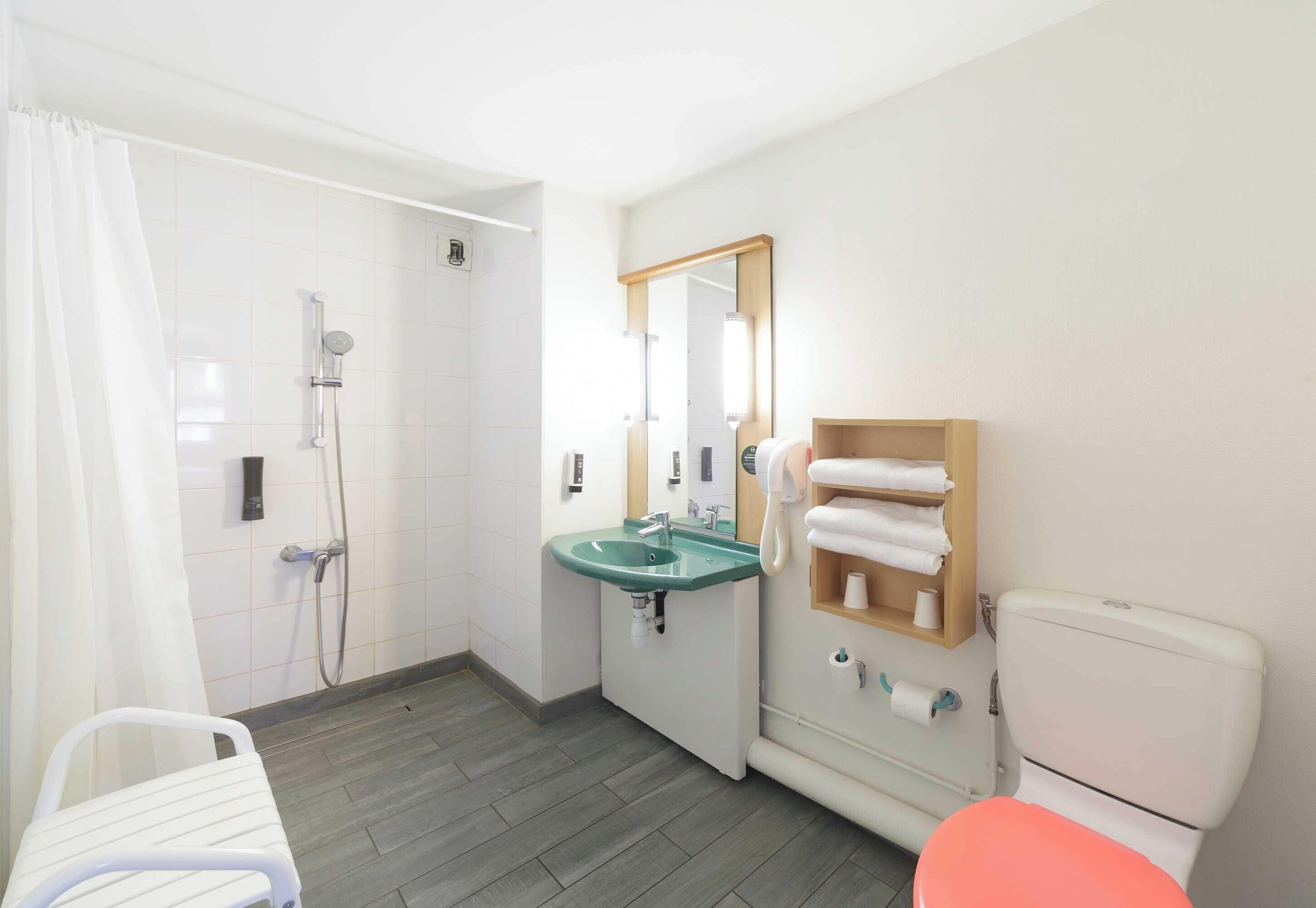 shower, eco-friendly toiletries, hair dryer, towels