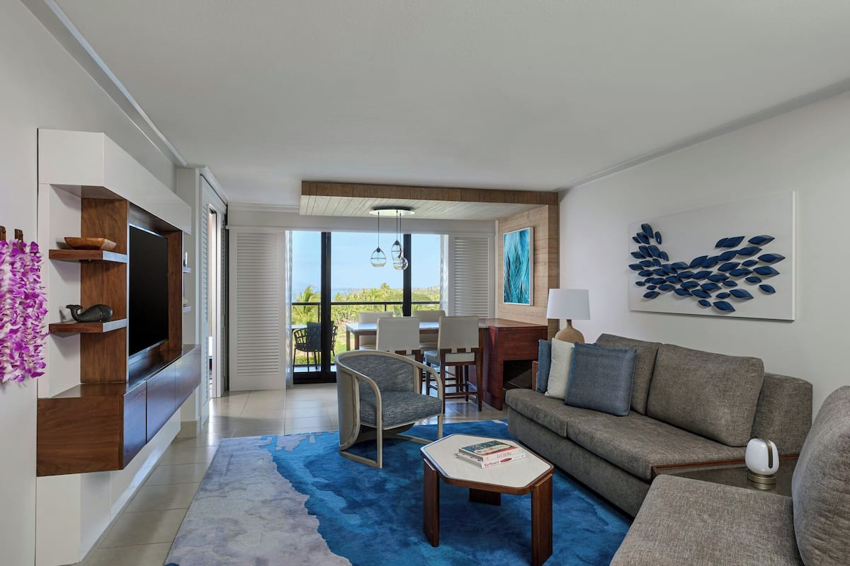 Suite, 1 Bedroom, Balcony | Living room | 55-inch Smart TV with cable channels, TV, Netflix