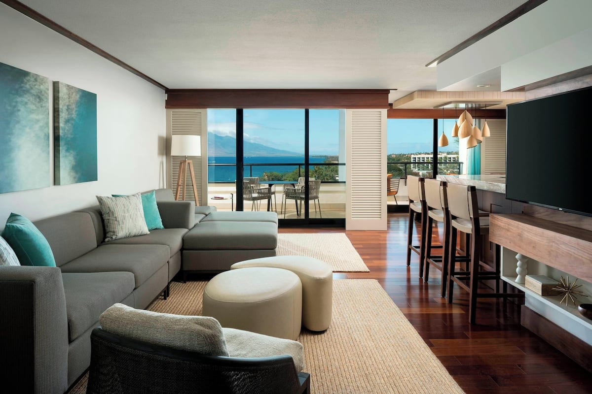 Premium Suite, 2 Bedrooms, Balcony | Living room | 55-inch Smart TV with cable channels, TV, Netflix
