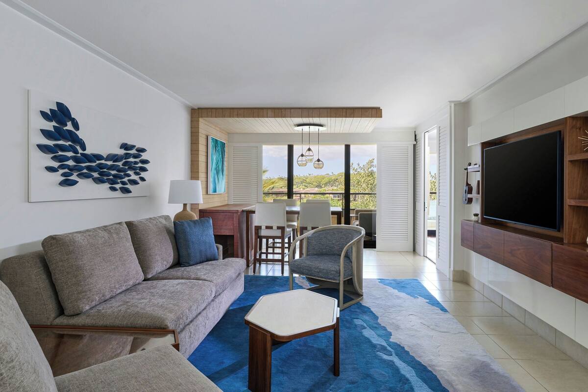Suite, 1 Bedroom, Garden View | Living room | 55-inch Smart TV with cable channels, TV, Netflix