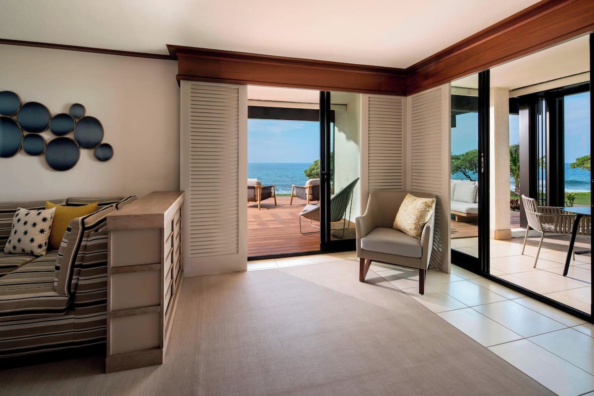 Suite, 1 King Bed, Oceanfront (Sundeck, Ground floor) | Living room | 55-inch Smart TV with cable channels, TV, Netflix