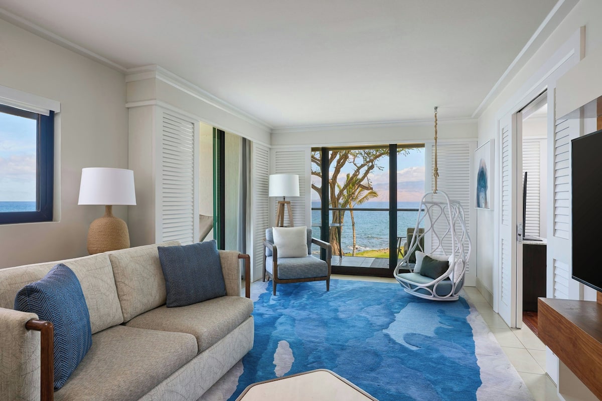 Suite, 1 Bedroom, Balcony, Oceanfront | Living room | 55-inch Smart TV with cable channels, TV, Netflix