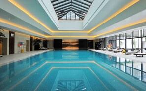 Indoor pool, open 6:00 AM to 10:30 PM, sun loungers, lifeguards on site