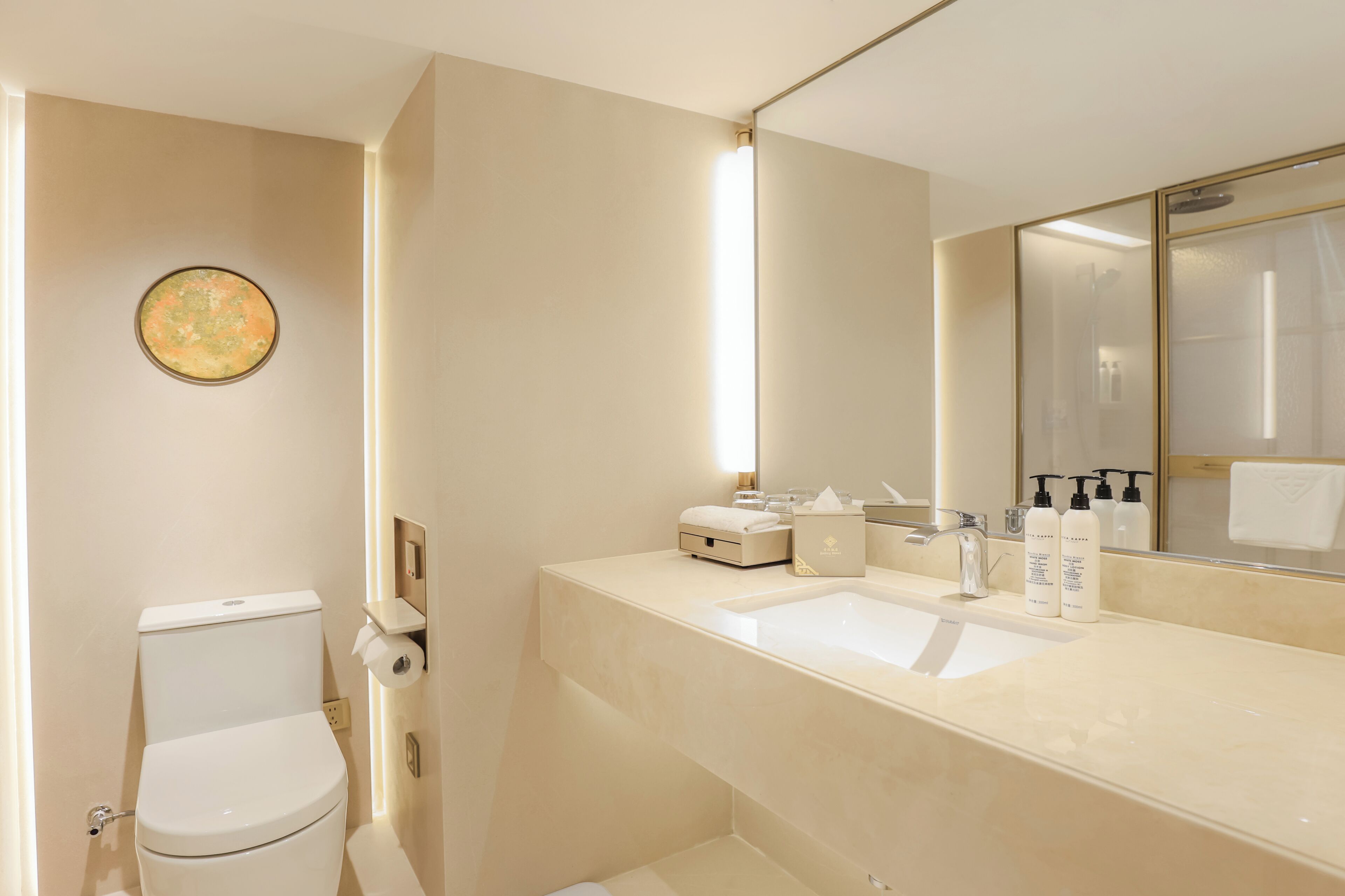 jinling tower harmonious charm deluxe room(twin) | bathroom | rainfall showerhead, eco-friendly toiletries, hair dryer, bathrobes
