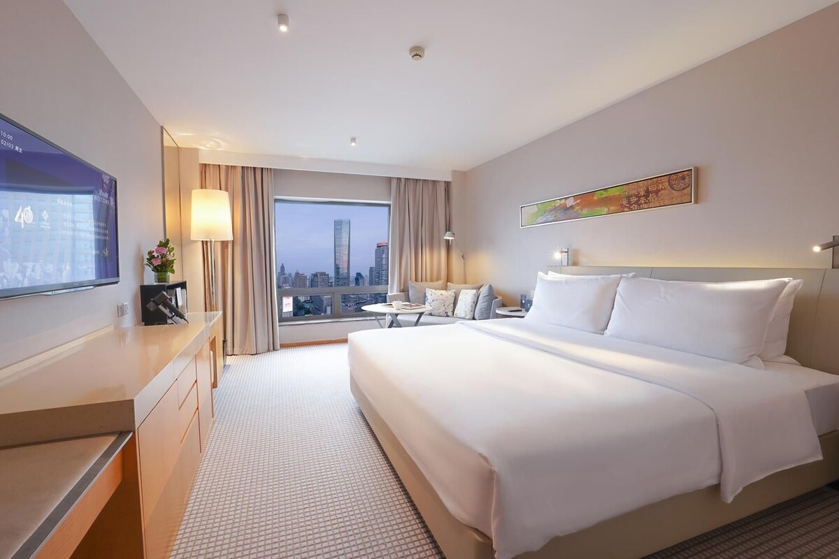 Ropa de cama de alta calidad, cubrecamas y minibar 