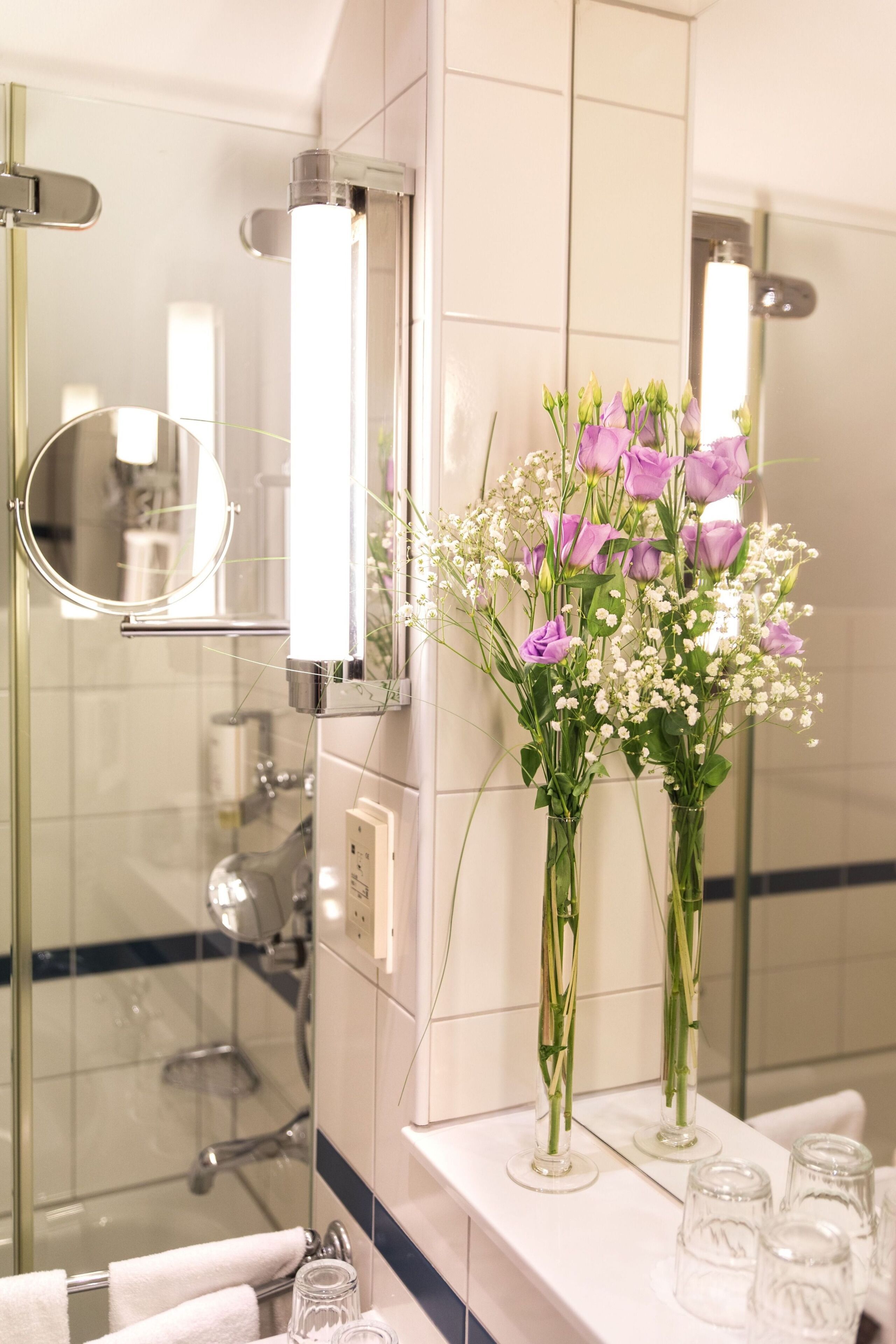 shower, eco-friendly toiletries, hair dryer, towels