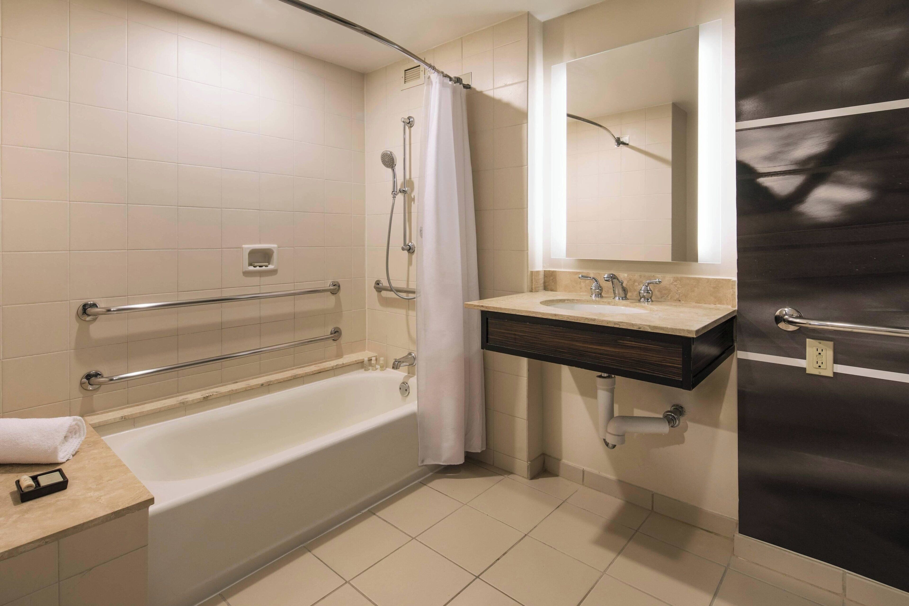 combined shower/bathtub, free toiletries, hair dryer, towels