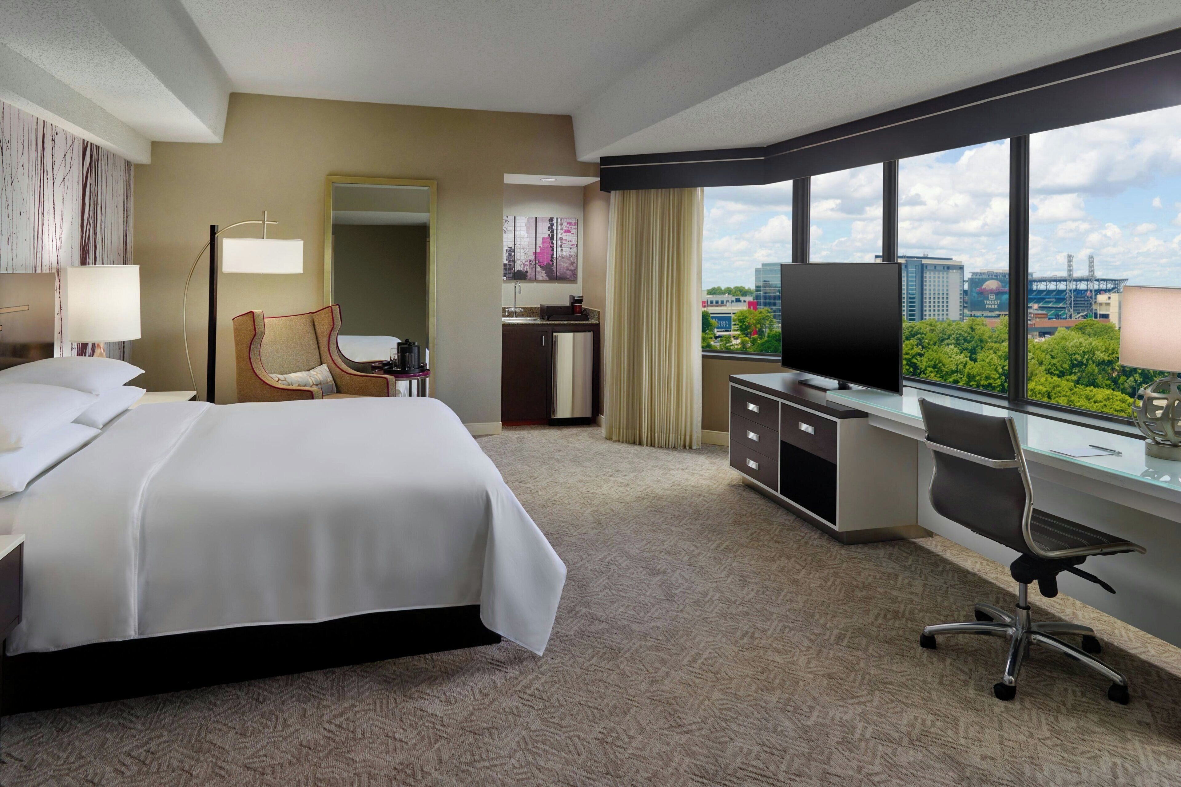 Pillow-top beds, minibar, in-room safe, desk