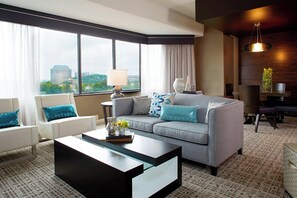 Suite, 1 Bedroom, Corner | Living area | 46-inch flat-screen TV with cable channels, TV, pay films
