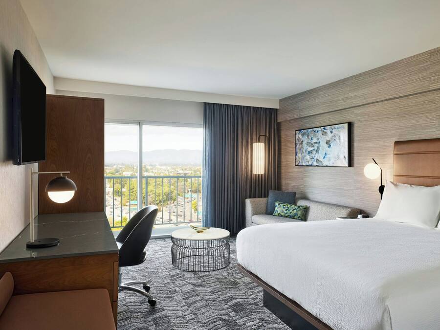 Premium bedding, pillow-top beds, in-room safe, desk