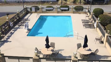 Seasonal outdoor pool, open 10:00 AM to 8:00 PM, pool loungers