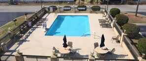 Seasonal outdoor pool, open 7 AM to 10 AM, sun loungers