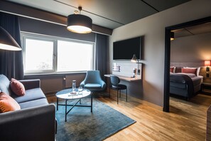 Junior Suite | In-room safe, desk, laptop workspace, blackout drapes