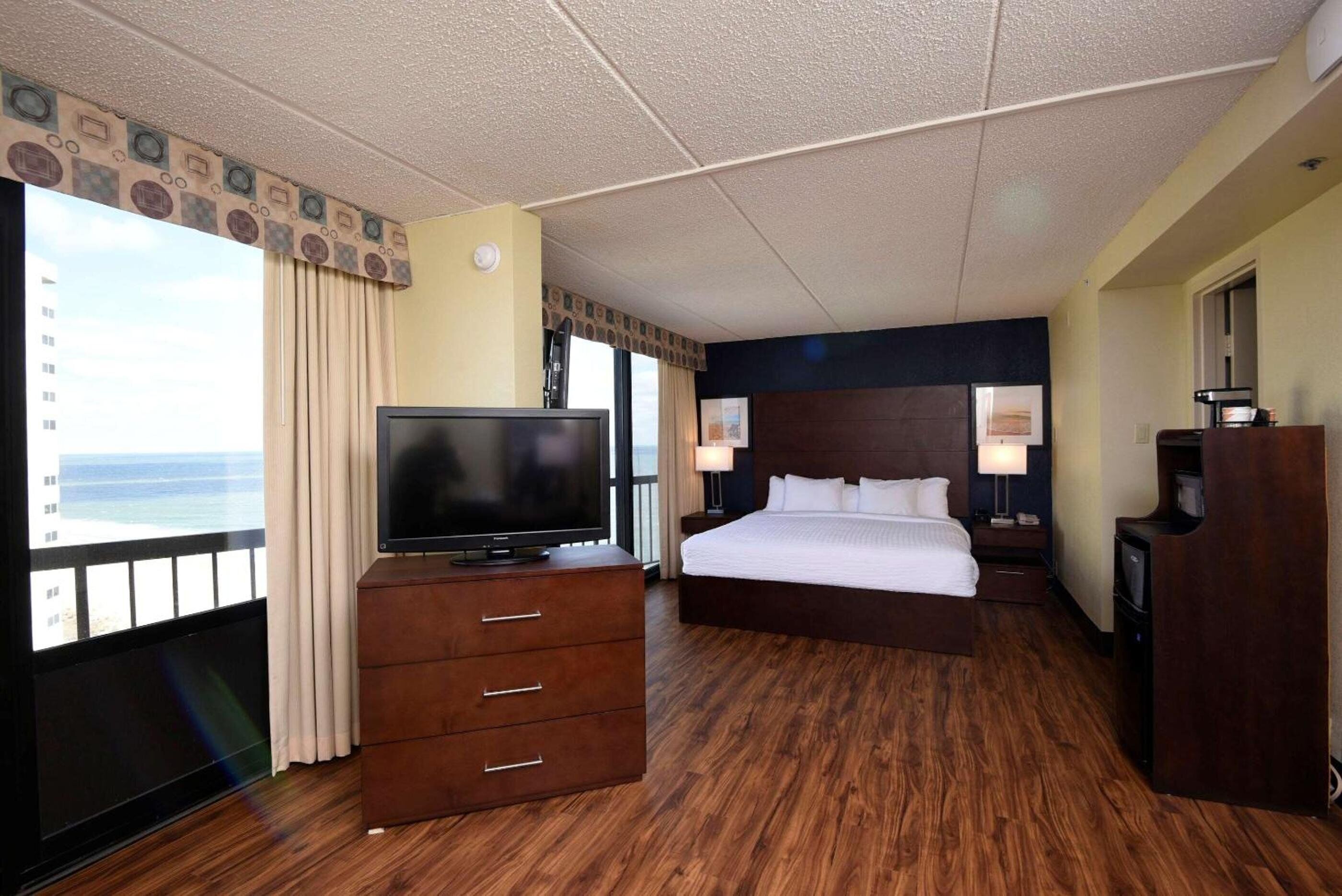 Premium bedding, down duvets, memory-foam beds, in-room safe