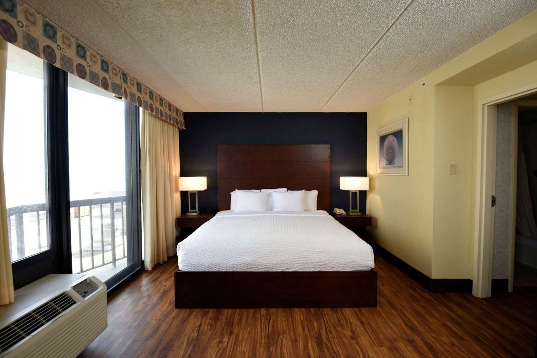 Premium bedding, down duvets, memory-foam beds, in-room safe