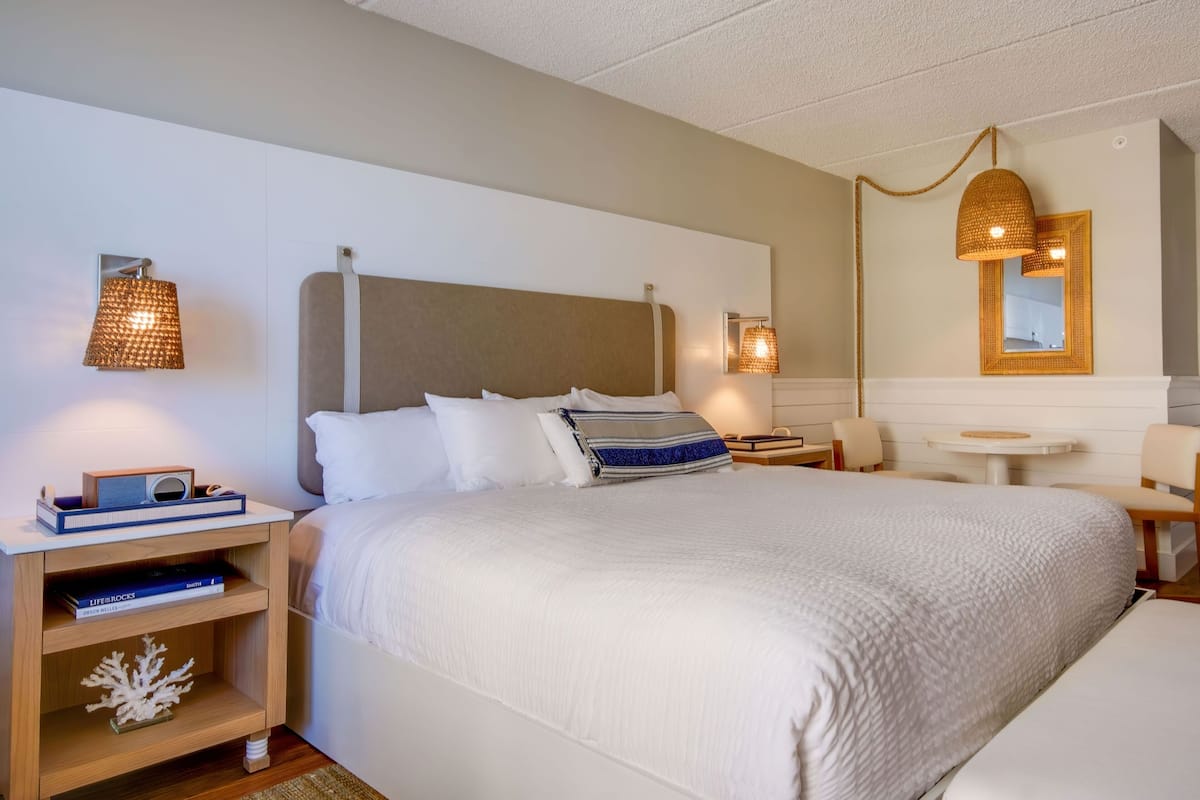 Premium bedding, down duvets, memory-foam beds, in-room safe