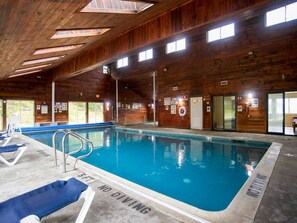 Indoor pool, open 9:00 AM to 9:00 PM, pool loungers