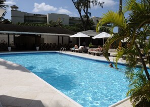 Outdoor pool, pool umbrellas, pool loungers