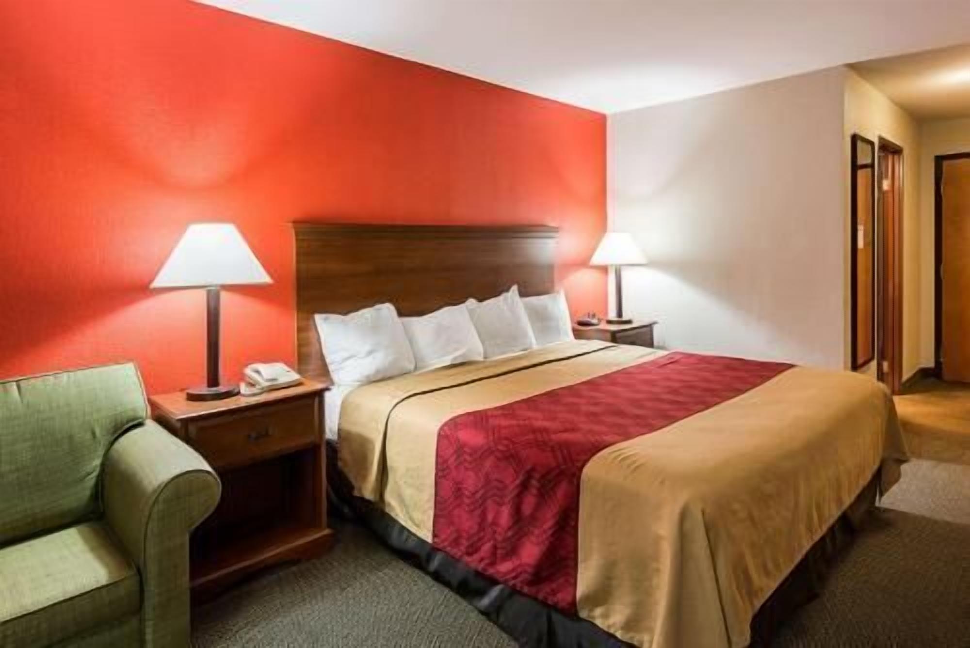 Desk, laptop workspace, blackout drapes, iron/ironing board