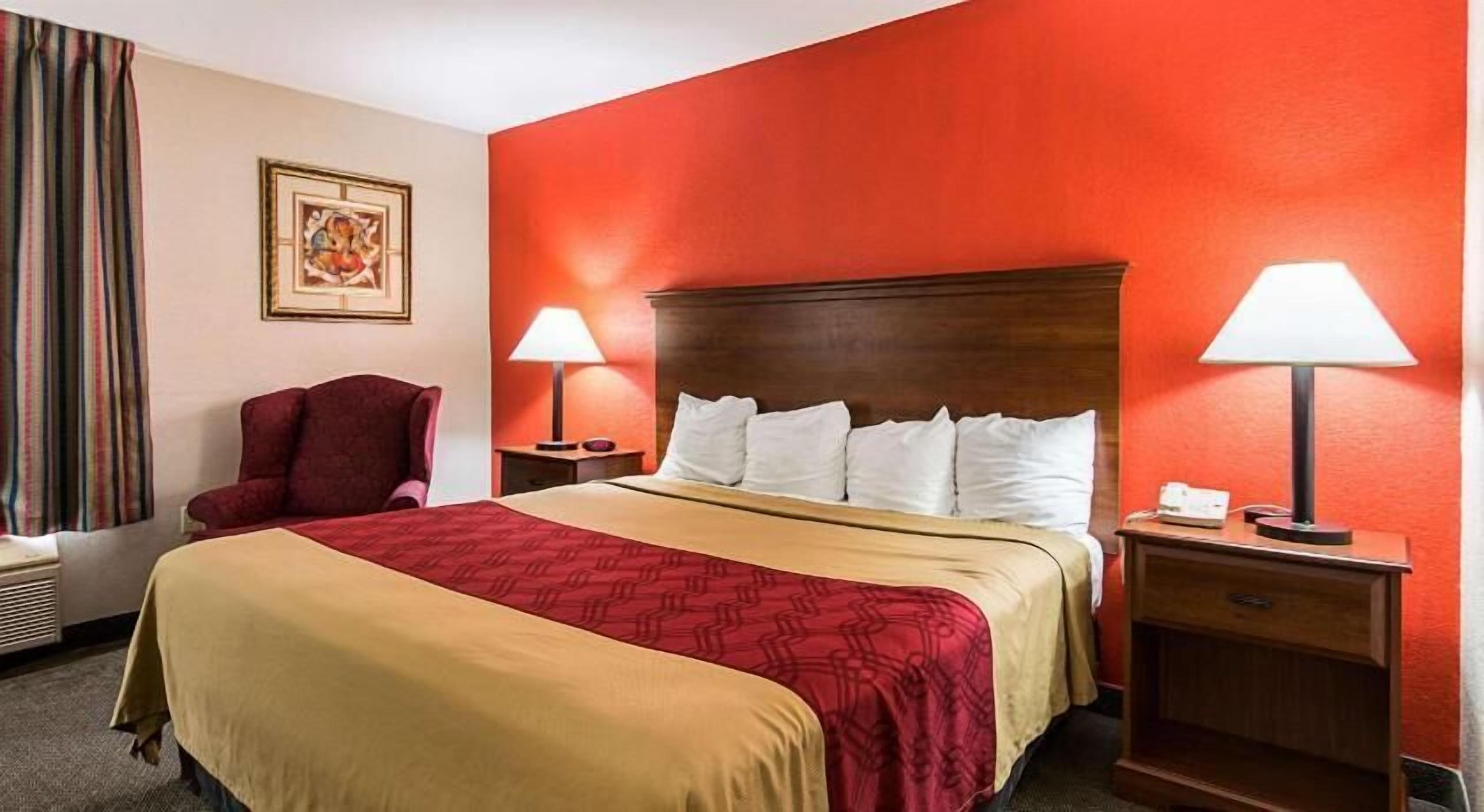 Desk, laptop workspace, blackout drapes, iron/ironing board