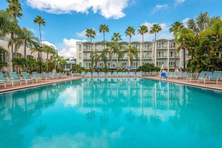 Indoor pool, outdoor pool, open 6:00 AM to 10:00 PM, pool umbrellas. Safety Harbor Resort & Spa Trademark Collection by Wyndham