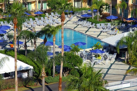 Indoor pool, outdoor pool, open 6:00 AM to 10:00 PM, pool umbrellas