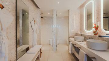 Premium bedding, down comforters, memory foam beds, minibar