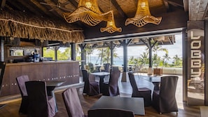 3 bars/lounges, swim-up bar, poolside bar