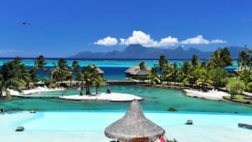 2 outdoor pools, pool umbrellas, sun loungers